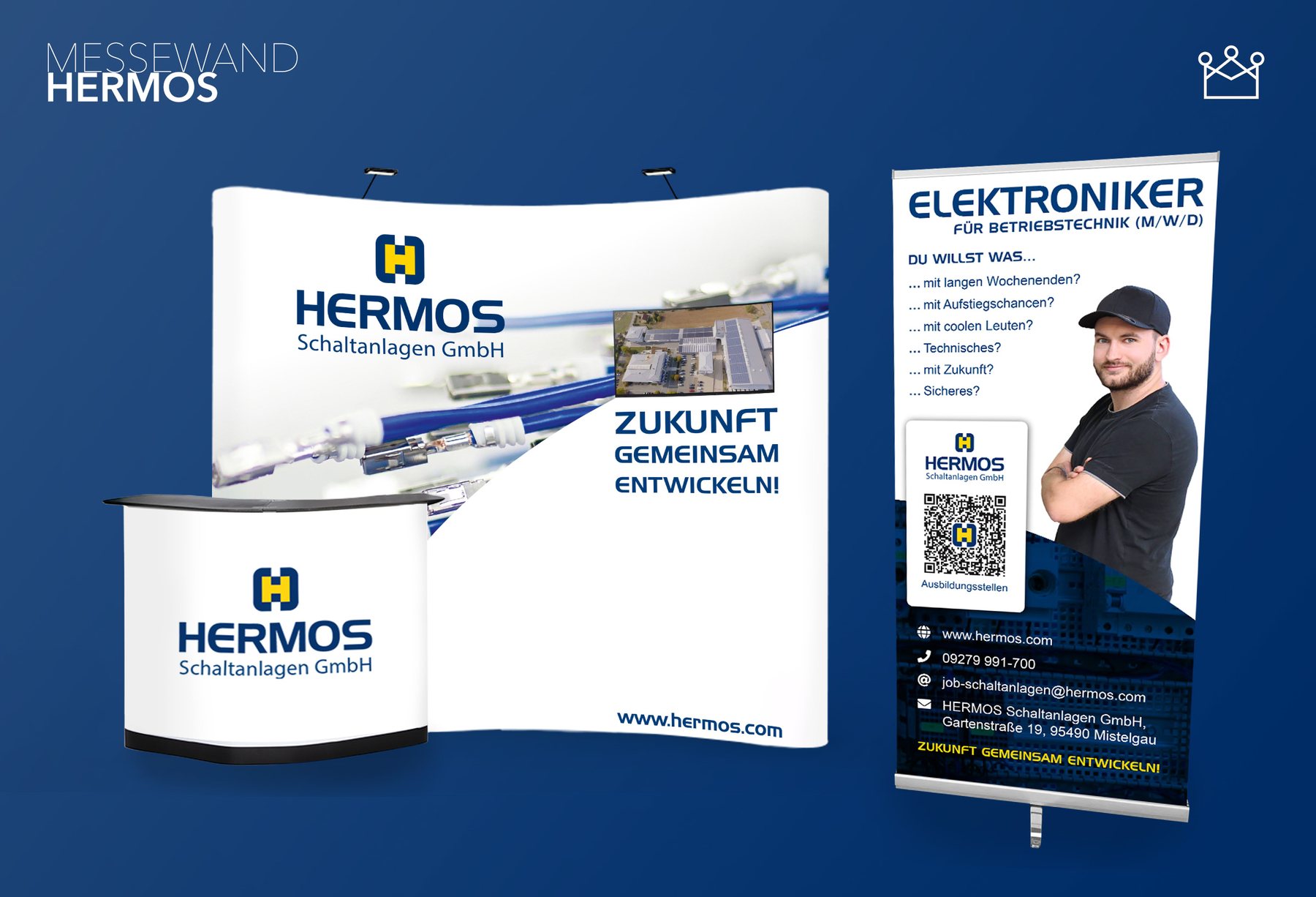 Messeauftritt von HERMOS mit Messewand, Bildschirm, Messetisch und Roll-up – gestaltet von KINGUNION